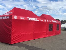 Zeltlandschaft aus zwei 6x3m QUICKUPTENT ALU-HEXAGON-Faltzelten
