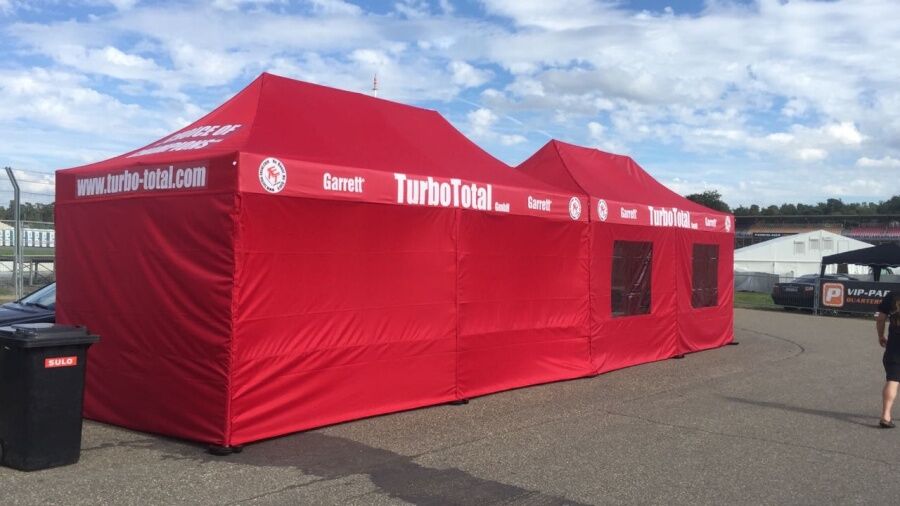 Zeltlandschaft aus zwei 6x3m QUICKUPTENT ALU-HEXAGON-Faltzelten